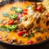 Copycat 54th Street Gringo Dip: Warm, bubbling bowl of Cheesy Zesty Copycat Gringo Dip with tortilla chips